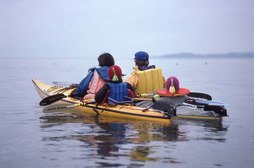 a family out kayaking