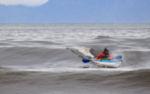 shore break kayak surfing photo by Stephanie Brown